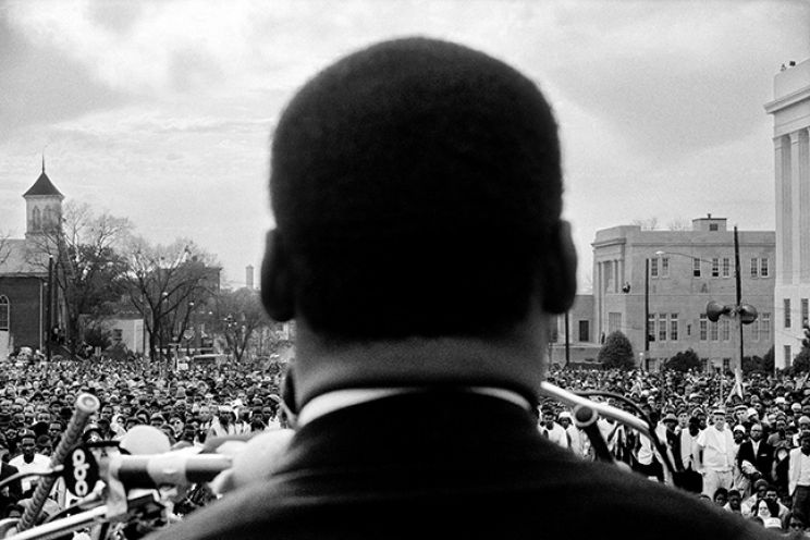 Dr. Martin Luther King, Jr. speaking to crowd of 25,000 at end of march